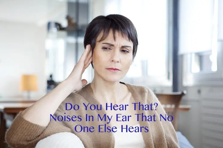 Holding ear because of noises